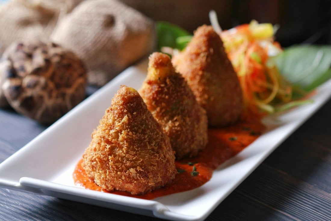 Authentic Sicilian Arancini: Crispy Rice Balls with Ragù and Mozzarella